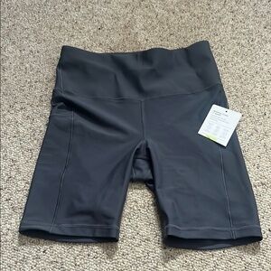 Athleta- Interval Stash 7” Short, brand new with tags, never worn.